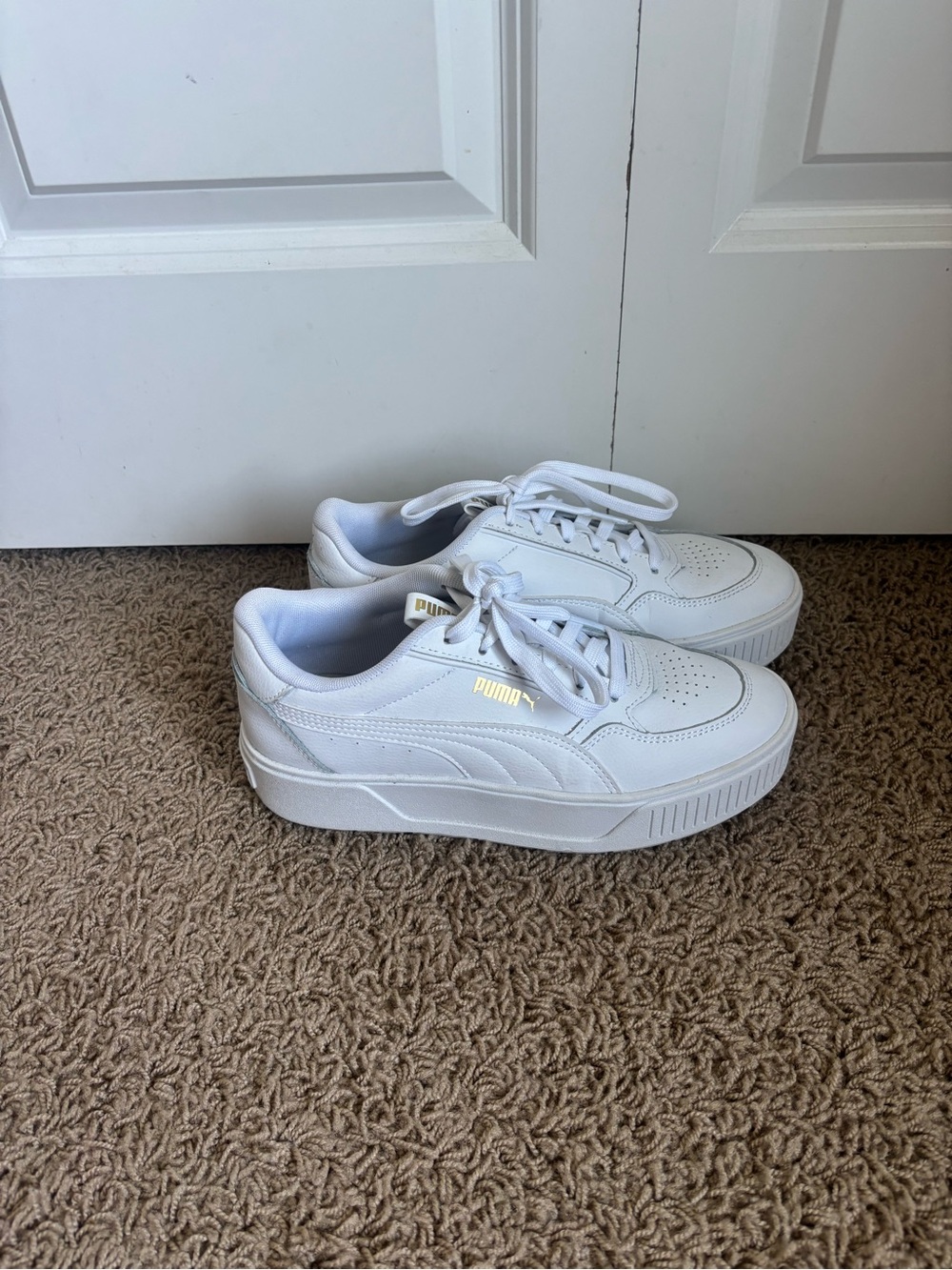 Puma  Women’s White Platform Sneakers with Gold Logo